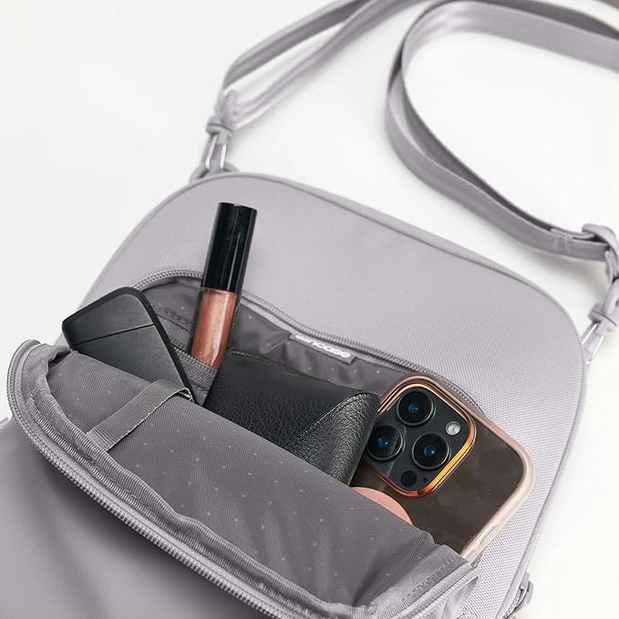 Incase A.R.C. Crossbody Bag - Lightweight Travel Organizer with Water-Resistant Design, Faux Fur Tablet Pocket, Adjustable Strap, Multiple Compartments, fits 11